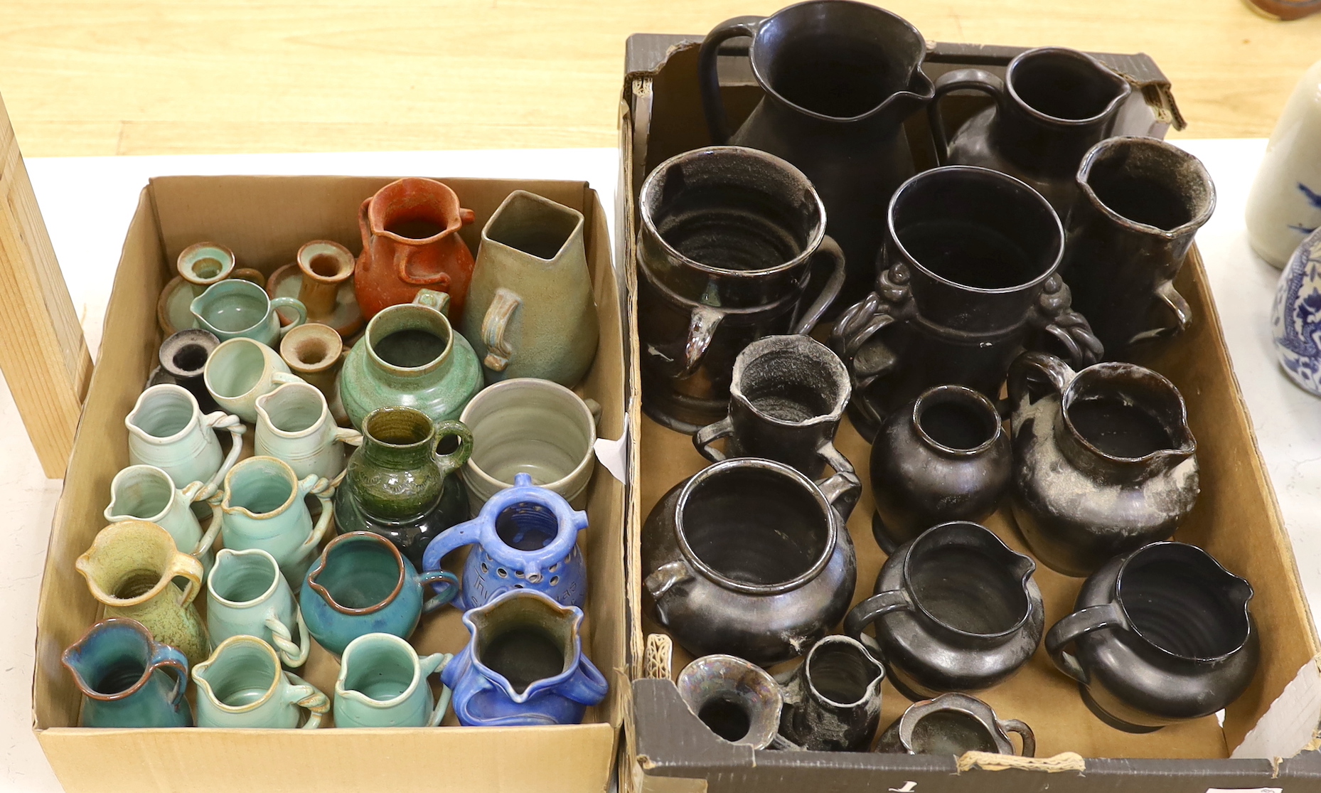 A large collection of assorted glazed Dickerware vases, jugs and pots
